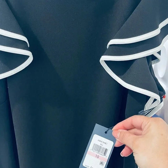 Elegant Black and White Ruffle Dress - Picture 6 of 8